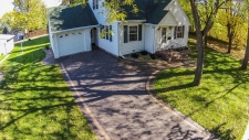Cobblestone driveway with path to front door