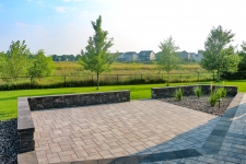 paver patio with sitting walls and plantings
