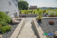 stepping stone path to retaining wall